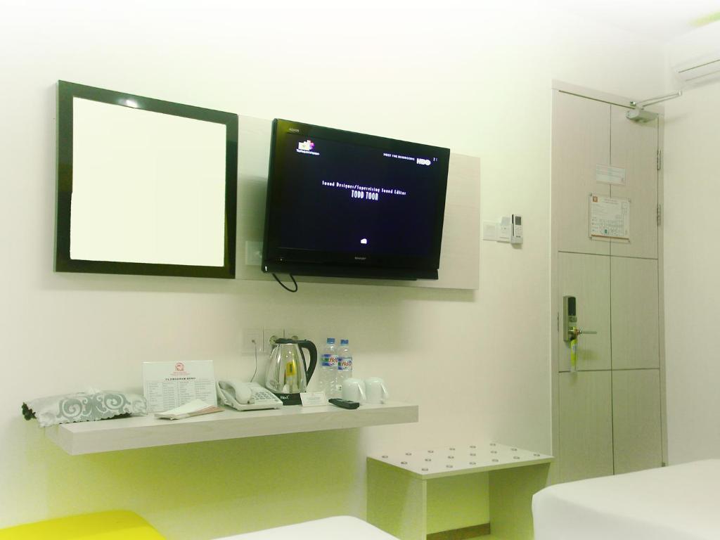 Dragon Inn Kendari Room photo